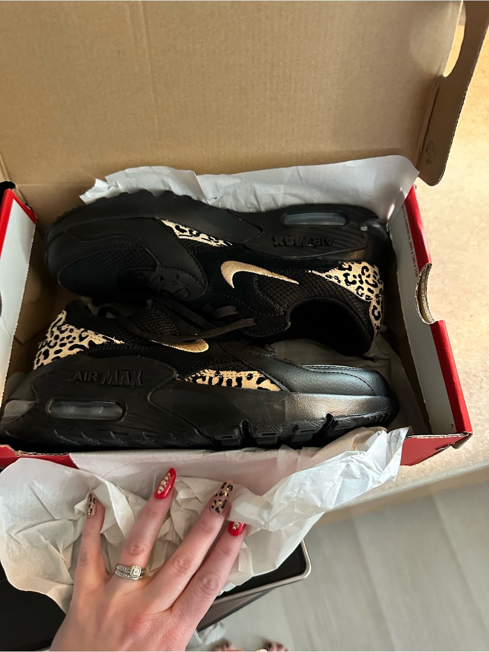 Nike Women's Black Sneakers with Leopard Accent